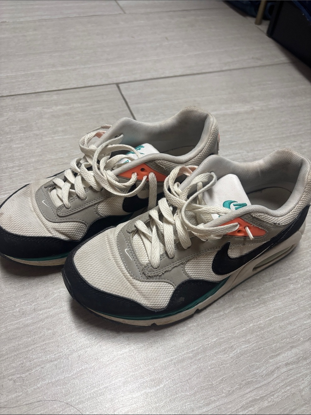 Nike Kids Cream White and Black Sneakers with Teal and Coral Accents